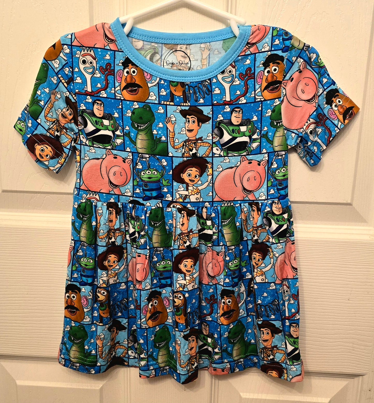 Oak & Ollie Bamboo Toystory Peplum Top